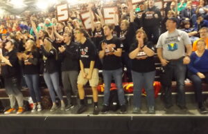 The robotics team celebrates during a 2019 competition.